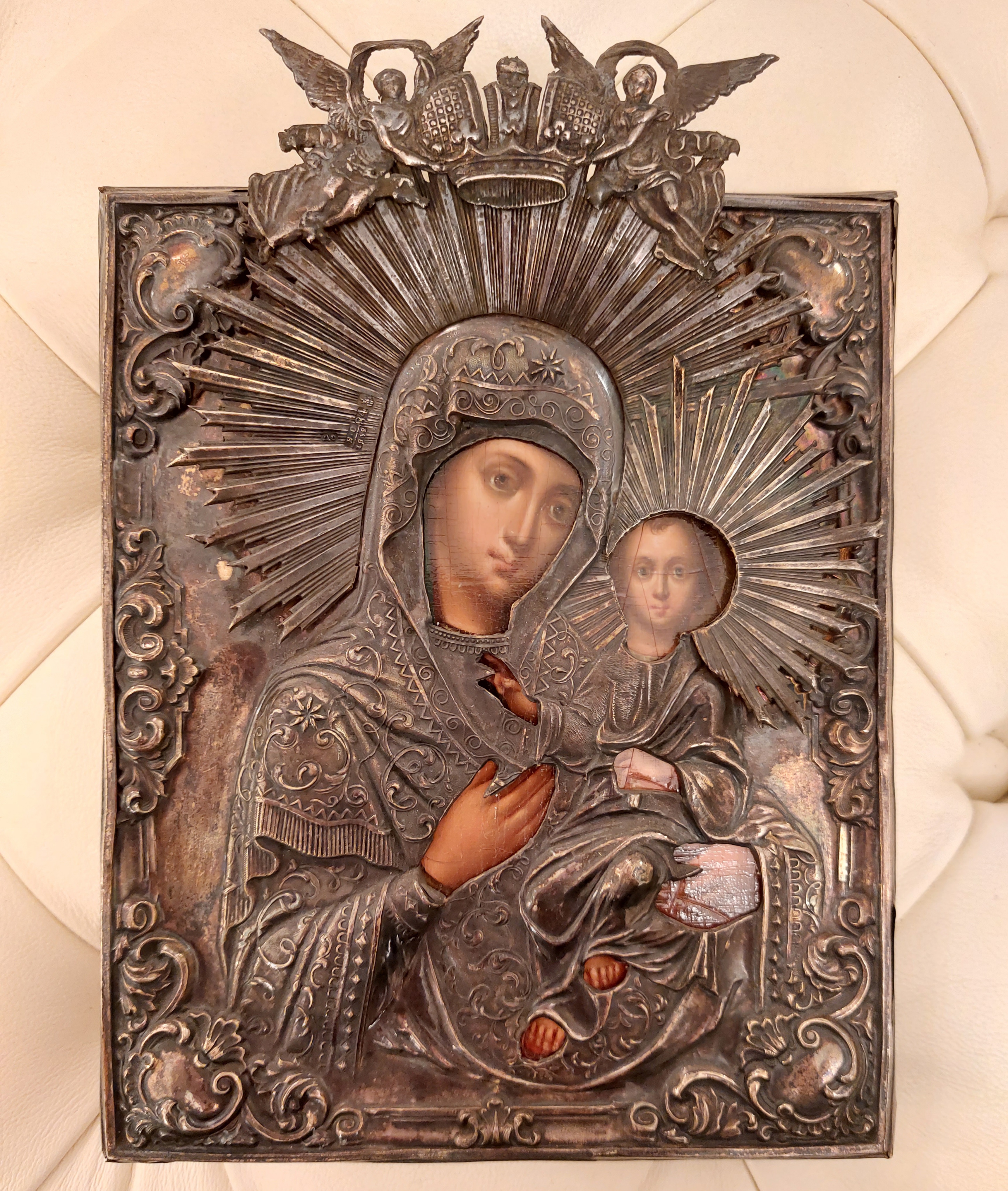 Икона старинная Божия Матерь в серебряном окладе уменьшенного размера