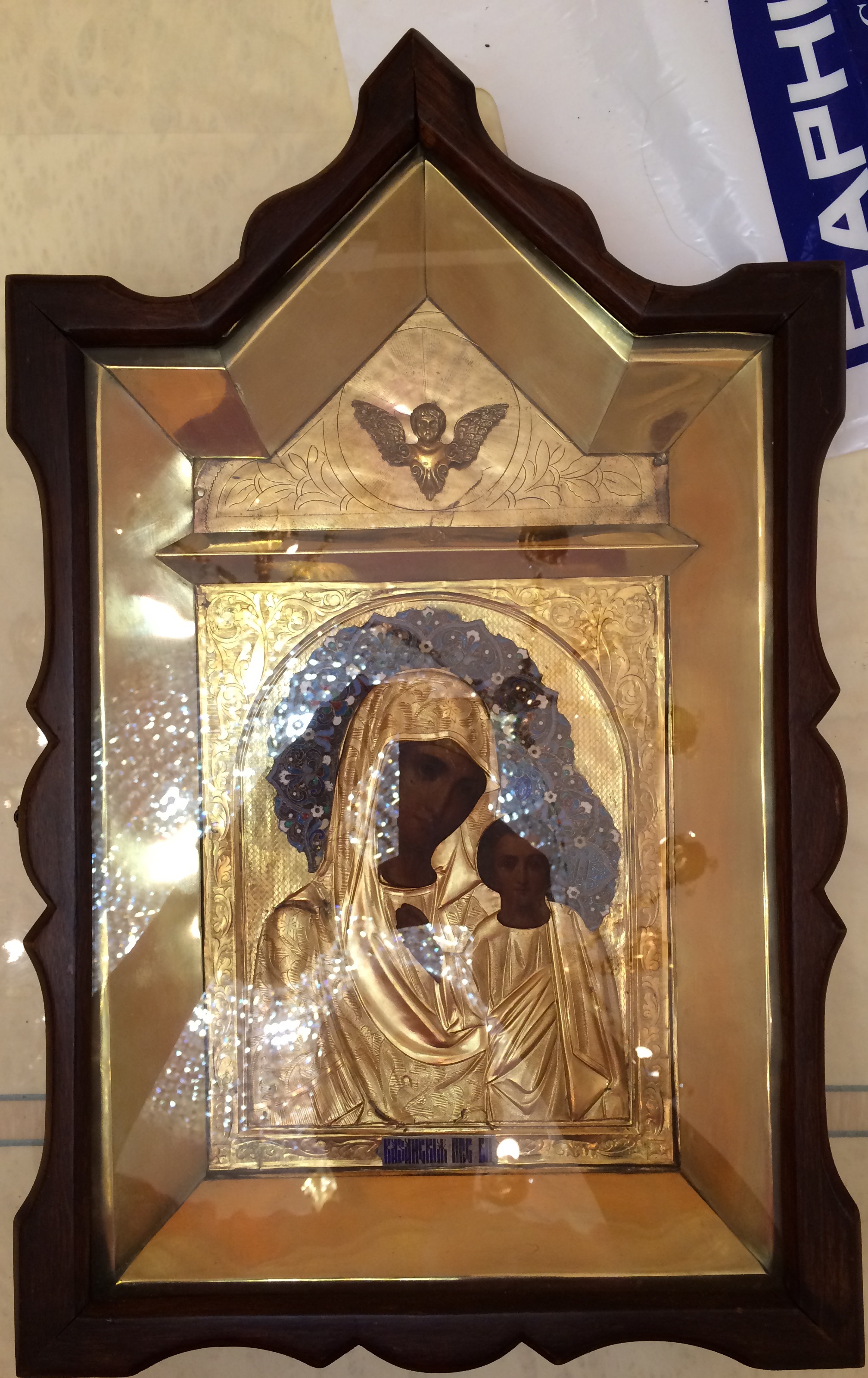 Икона старинная Богоматерь Казанская в серебряном окладе с эмалевым венцом и эмалевыми накладками